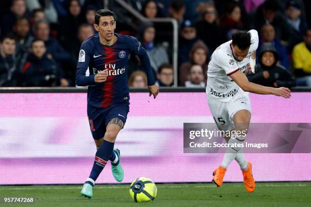 Angel Di Maria of Paris Saint Germain, Ramy Bensebaini of Stade Rennes during the French League 1 match between Paris Saint Germain v Rennes at the...