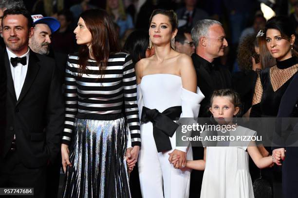 French actor Stephane Rideau, French actress Amelie Daure, French actress Marion Cotillard, and French actress Ayline Aksoy-Etaix arrive on May 12,...