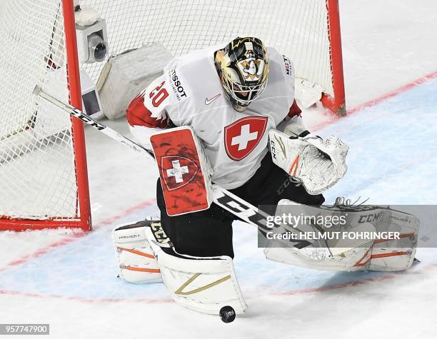 Reto Berra of Switzerland stops a puck during the group A match between Russia and Switzerland at the 2018 IIHF Ice Hockey World Championship at the...