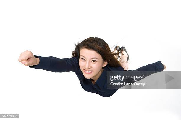 young businesswoman flying - super excited suit stock pictures, royalty-free photos & images