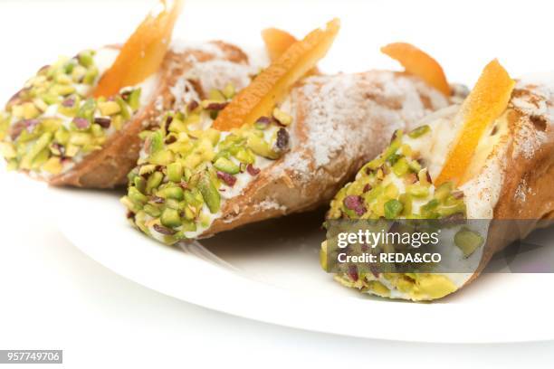 Cannoli with Ricotta Cheese Orange Zest and Chopped Pistachios. Sicily. Italy. Europe.