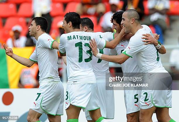 Algerian players celebrate their goal to 1:0 during the 2nd round qualifing match of the African Cup of Nations football championships CAN2010...