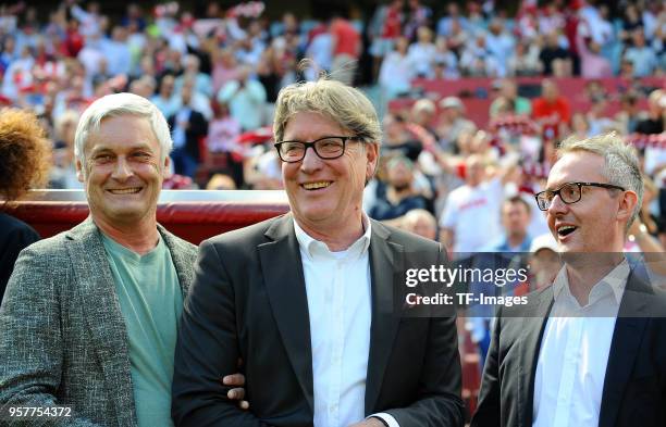 Armin Veh of Koeln, Harald Toni Schumacher of Koeln and Alexander Wehrle of Koeln laughs prior to the Bundesliga match between 1. FC Koeln and FC...