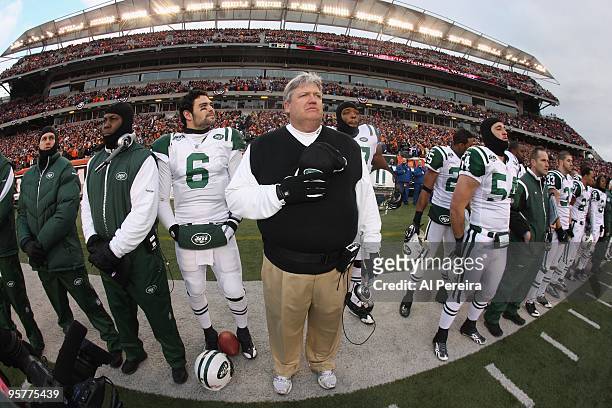 Head Coach Rex Ryan and Quarterback Mark Sanchez of the New York Jets stands at the line during the National Anthem before the game against the...