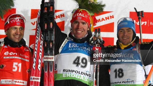 Emil Hegle Svendsen of Norway celebrates after winning the Men's 10km Sprint in the e.on Ruhrgas IBU Biathlon World Cup ahead of Ole Einar...