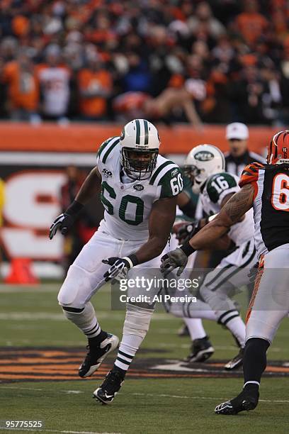 Tackle D'Brickashaw Ferguson of the New York Jets blocks against the Cincinnati Bengals during their Wildcard Playoff game at Paul Brown Stadium on...