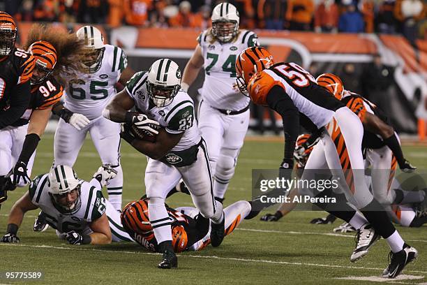 Running Back Shonn Greene of the New York Jets has a long run against the Cincinnati Bengals during their Wildcard Playoff game at Paul Brown Stadium...