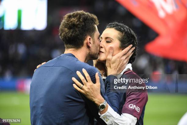 Thiago Motta kisses his wife during the Ligue 1 match between Paris Saint Germain and Stade Rennes at Parc des Princes on May 12, 2018 in Paris, .