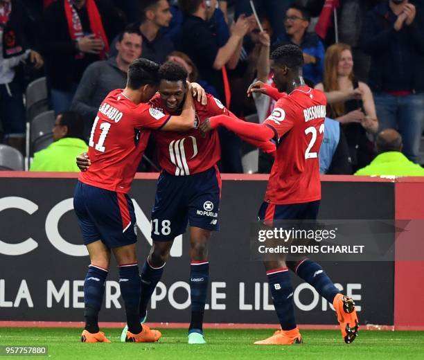 Lille's forward Lebo Mothiba celebrates with teammates during the French L1 football match between Lille OSC and Dijon at the Pierre-Mauroy Stadium...