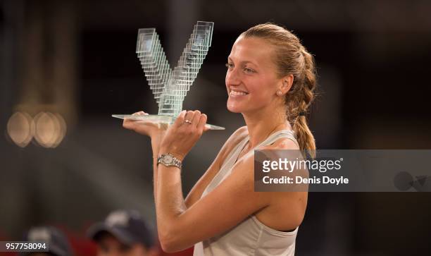 Petra Kvitova of the Czech Republic celebrates with her trophy after beating Kiki Bertens of the Netherlands in three sets in the womens final during...