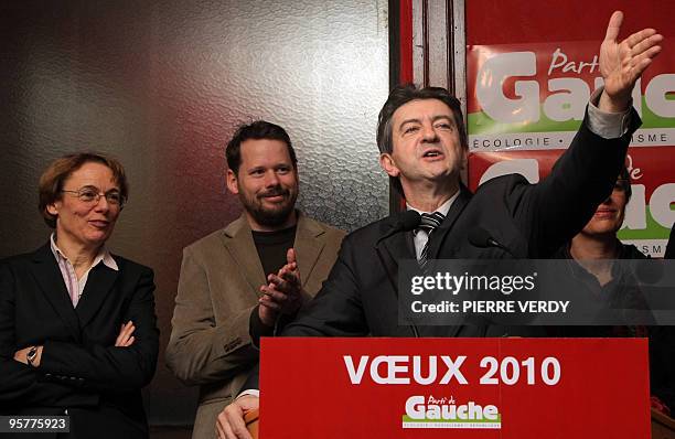 French president of the new left wing party Parti de Gauche , Jean-Luc Melenchon, addresses his New Year Wishes next to party members Martine Billard...