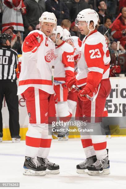 Nicklas Lidstrom and Brad Stuart of the Detroit Red Wings talk on the ice during the game against the Los Angeles Kings on January 7, 2010 at Staples...