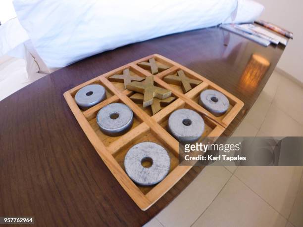 a wooden tic tac toe game - tic tac stock pictures, royalty-free photos & images