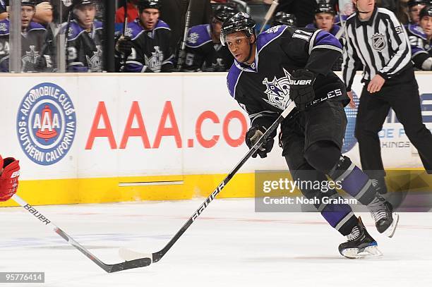 Wayne Simmonds of the Los Angeles Kings skates with the puck against the Detroit Red Wings on January 7, 2010 at Staples Center in Los Angeles,...