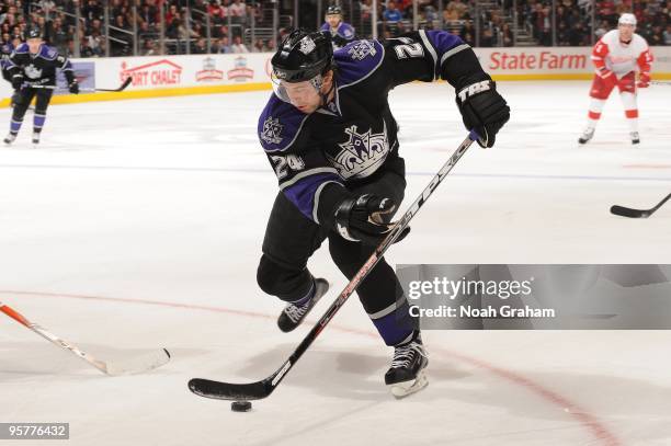 Alexander Frolov of the Los Angeles Kings skates with the puck against the Detroit Red Wings on January 7, 2010 at Staples Center in Los Angeles,...