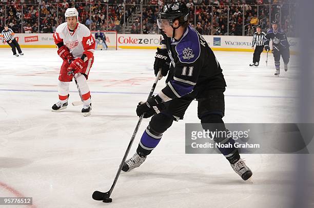 Anze Kopitar of the Los Angeles Kings skates with the puck against the Detroit Red Wings on January 7, 2010 at Staples Center in Los Angeles,...