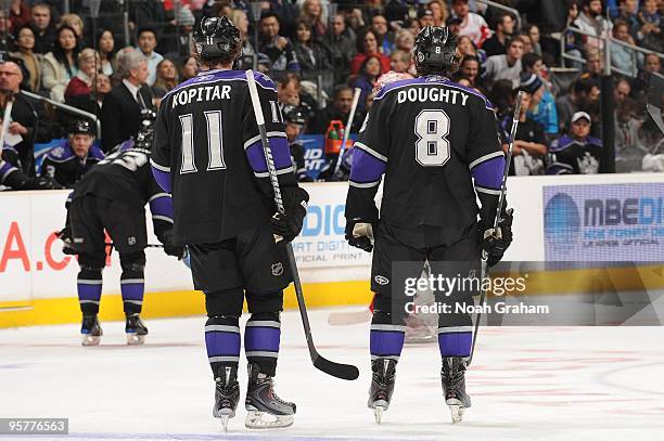 Anze Kopitar and Drew Doughty of the Los Angeles Kings skate to the bench against the Detroit Red Wings on January 7, 2010 at Staples Center in Los...