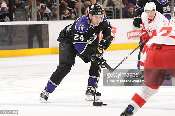 Alexander Frolov of the Los Angeles Kings skates with the puck against the Detroit Red Wings on January 7, 2010 at Staples Center in Los Angeles,...