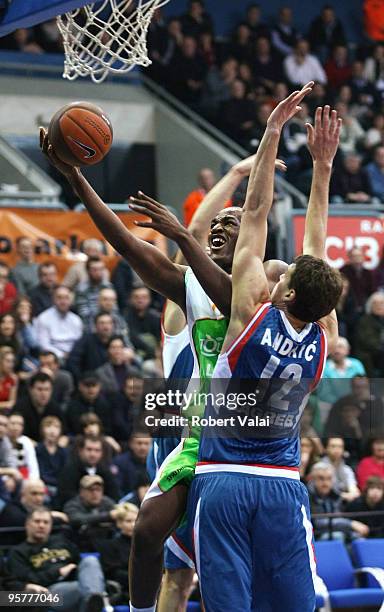 Ali Traore, #12 of Asvel Basket Lyon Villeurbane competes with Luksa Andric, #12 of Cibona in action during the Euroleague Basketball Regular Season...