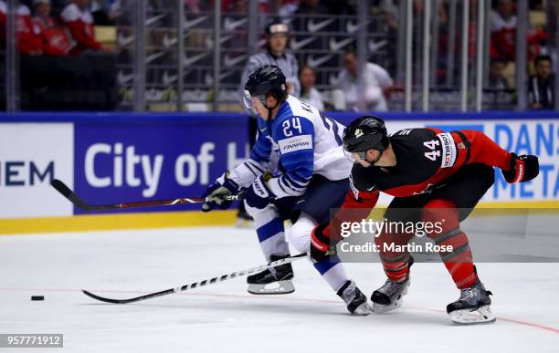 Marc Vlasic of Canada and Kasperi Kapanen of Finland during the 2018 IIHF Ice Hockey World Championship Group B game between Canada and Finland at...
