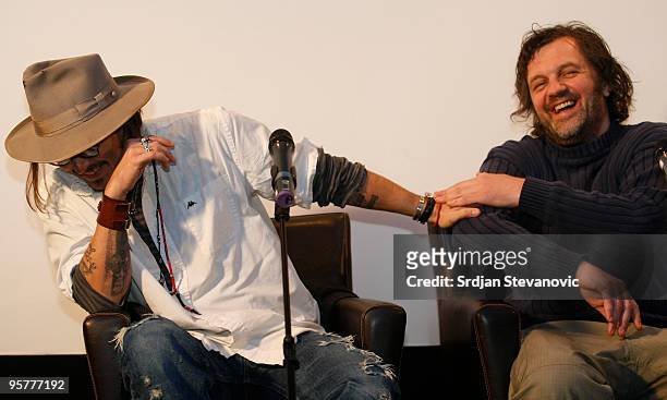 Johnny Depp and Emir Kusturica attend a press conference during the Kustendorf music & film festival on January 14, 2010 in Belgrade, Serbia.
