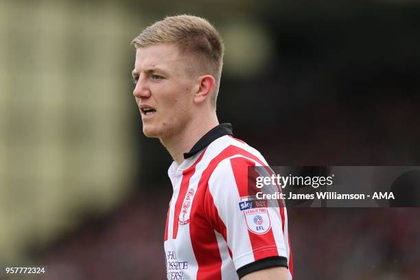 Scott Wharton of Lincoln City during the Sky Bet League Two Play Off Semi Final:First Leg between Lincoln City and Exeter City at Sincil Bank Stadium...