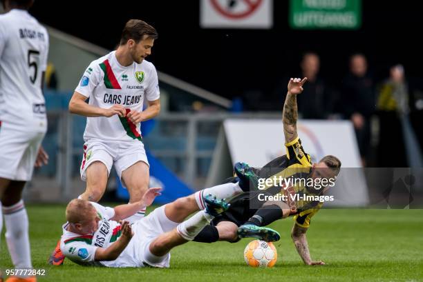 Tom Tommie Beugelsdijk of ADO Den Haag, Erik Falkenburg of ADO Den Haag, Tim Matavz of Vitesse during the Dutch Eredivisie play-offs match between...