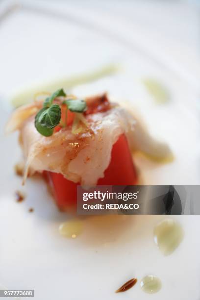 Watermelon Jelly with Codfish's Carpaccio and Pickled Ginger. Il Pagliaccio Restaurant. Via Dei Banchi Vecchi 129a. Rome. Lazio. Italy.