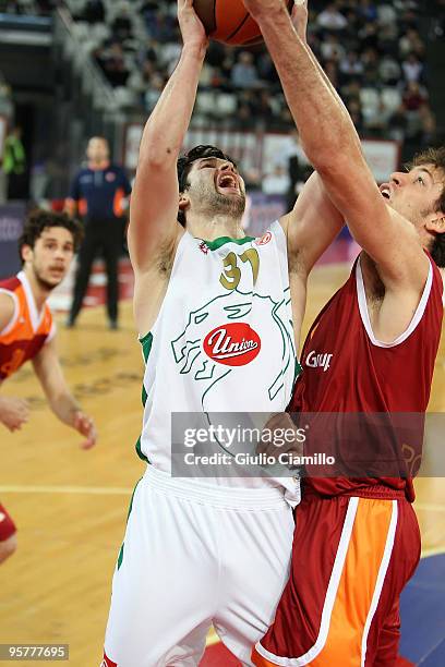 Saso Ozbolt, #31 of Union Olimpija shots over Angelo Gigli, #6 of Lottomatica Roma during the Euroleague Basketball Regular Season 2009-2010 Game Day...