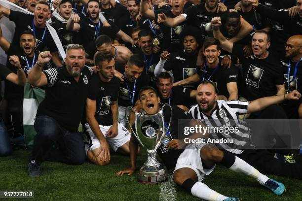 Players of PAOK celebrate the victory with the trophy after the Greek cup final match between AEK Athens F.C. And PAOK FC at Athens Olympic Sports...