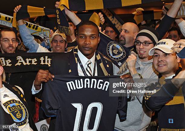 First overall draft pick Danny Mwanga of the Philadelphia Union poses for a photograph with fans during the 2010 MLS SuperDraft on January 14, 2010...