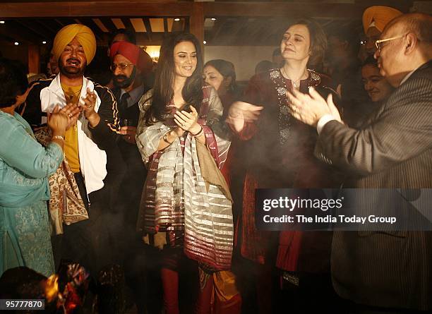 Preity Zinta and Cherie Blair celebrate Lohri in New Delhi on Wednesday, January 13, 2010.