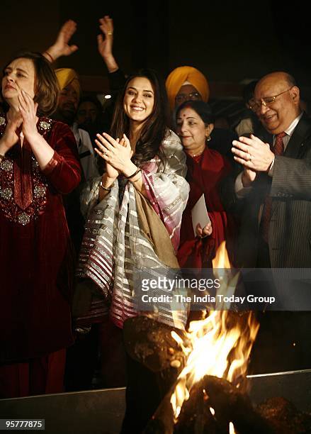 Preity Zinta and Cherie Blair celebrate Lohri in New Delhi on Wednesday, January 13, 2010.
