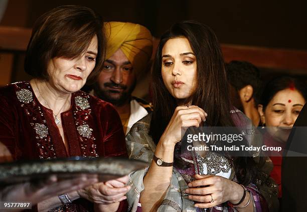Preity Zinta and Cherie Blair celebrate Lohri in New Delhi on Wednesday, January 13, 2010.