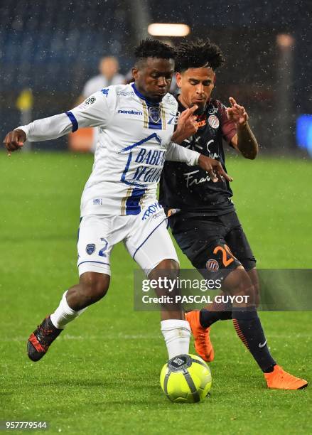 Troyes' French defender Jeremy Cordoval vies with Montpellier's South African forward Keagan Dolly during the French L1 football match between MHSC...