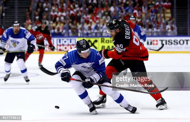 Ryan O'Reilly of Canada and Markus Nutivaara of Finland during the 2018 IIHF Ice Hockey World Championship Group B game between Canada and Finland at...
