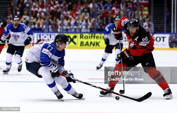 Ryan O'Reilly of Canada and Markus Nutivaara of Finland during the 2018 IIHF Ice Hockey World Championship Group B game between Canada and Finland at...