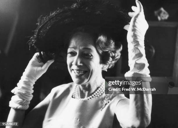 Portrait of American socialite and philanthropist Brooke Astor as she adjust her hat at an event in Central Park, New York, New York, January 18,...