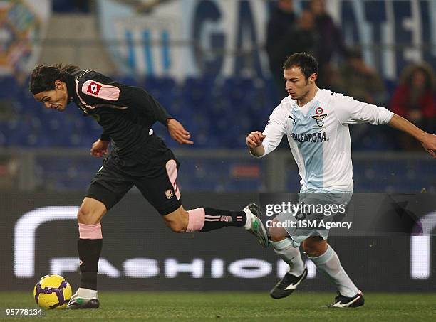 Stefan Radu of SS Lazio and Cavani of US citta' di Palermo in action during the Tim Cup between Lazio and Palermo at Olimpico Stadium on January 14,...