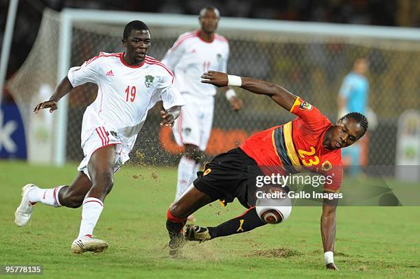 Davie Banda of Malawi and Angola's Manucho in action during the Africa Cup of Nations match between Angola and Malawi at Cidade Universitaria Stadium...