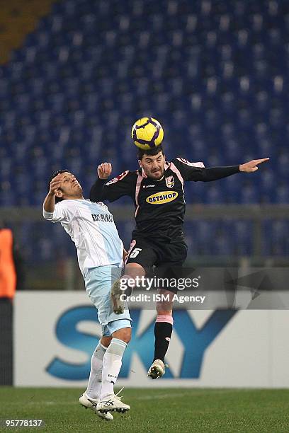 Sergio Floccari of SS Lazio and Cesare Bovo of US citta' di Palermo in action during the Tim Cup between Lazio and Palermo at Olimpico Stadium on...