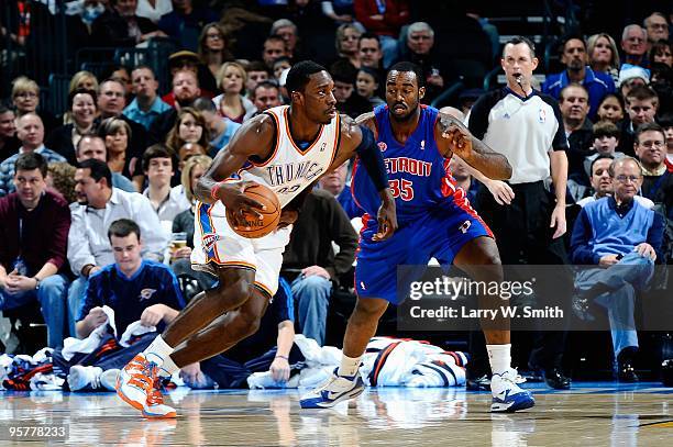 Jeff Green of the Oklahoma City Thunder drives past DaJuan Summers of the Detroit Pistons during the game on December 18, 2009 at the Ford Center in...