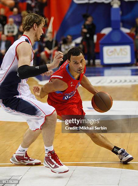 Trajan Langdon, #21 of CSKA Moscow competes with Tiago Splitter, #21 of Caja Laboral in action during the Euroleague Basketball Regular Season...