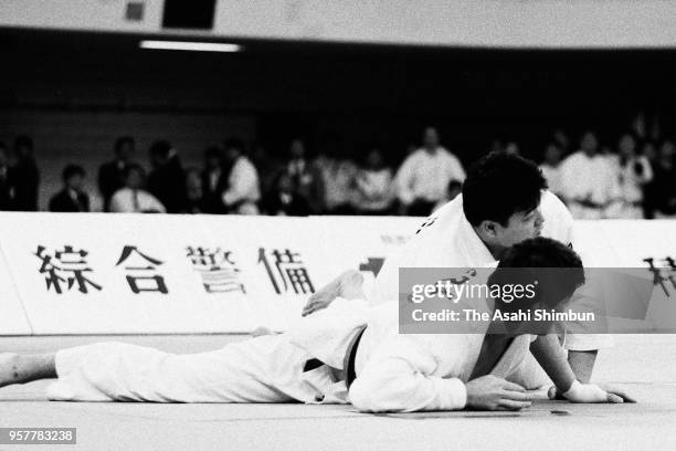 Naoya Ogawa of Japan David Douillet of France compete in the openweight final on day three of the Kano Cup International Judo Championships at Nippon...