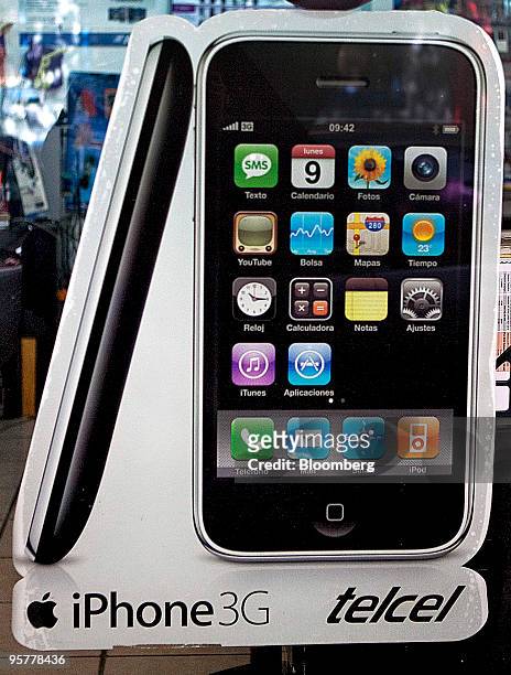 Banner promotes the Apple iPhone in a store for Telcel, America Movil SAB's Mexican wireless unit, in Mexico City, Mexico, on Thursday, Jan. 14,...