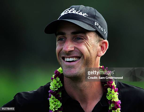 Geoff Ogilvy of Australia smiles after winning the SBS Championship at the Plantation course on January 10, 2010 in Kapalua, Maui, Hawaii.