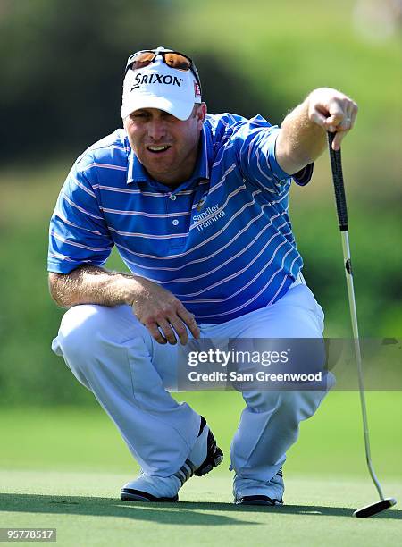 John Rollins looks over a putt during the final round of the SBS Championship at the Plantation course on January 10, 2010 in Kapalua, Maui, Hawaii.