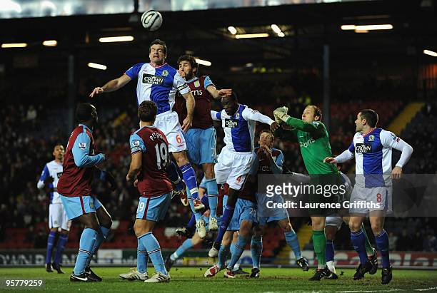 Ryan Nelsen of Blackburn Rovers leaps to win the ball during the Carling Cup Semi Final match between Blackburn Rovers and Aston Villa at Ewood Park...