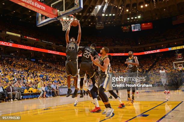 Kevon Looney of the Golden State Warriors dunks the ball against the New Orleans Pelicans in Game Two of the Western Conference Semifinals during the...