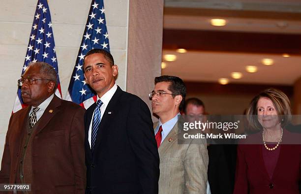 President President Barack Obama walks with Rep.James Clyburn and House Speaker Nancy Pelosi after arriving at the US Capitol on January 14, 2010 in...